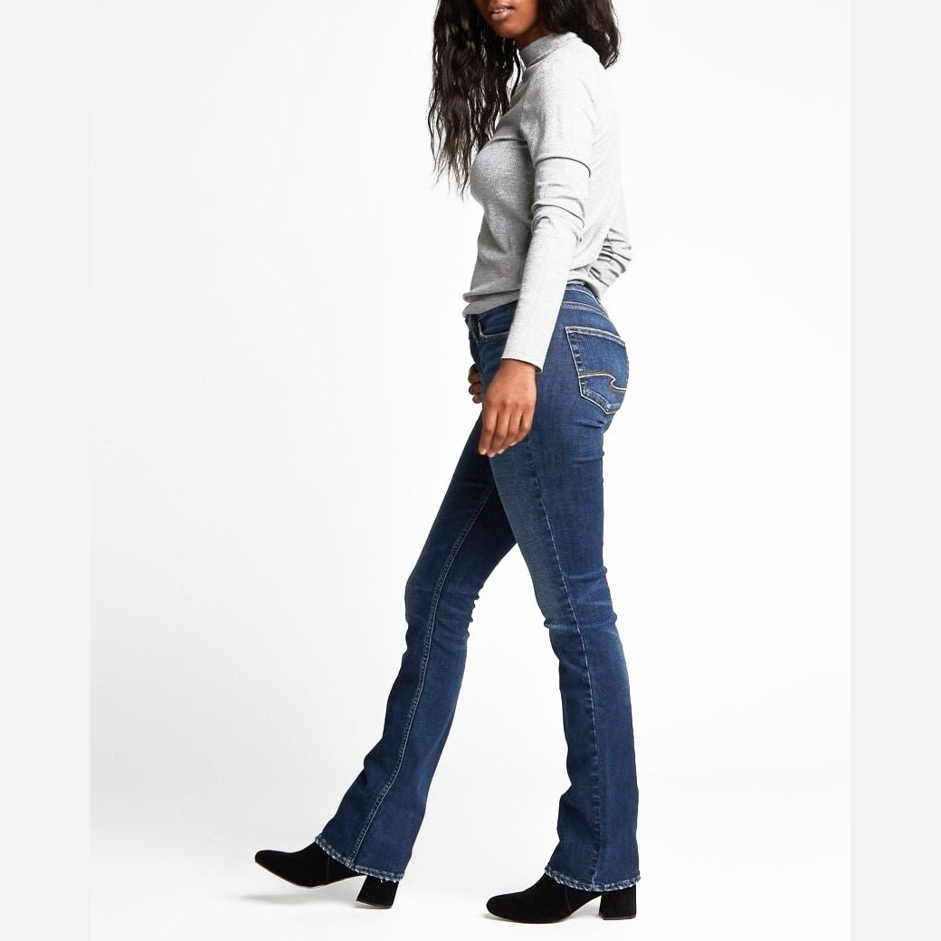 Silver Jeans Aiko mid-rise slim bootcut jean showing close-up of the back pockets and signature embroidery.