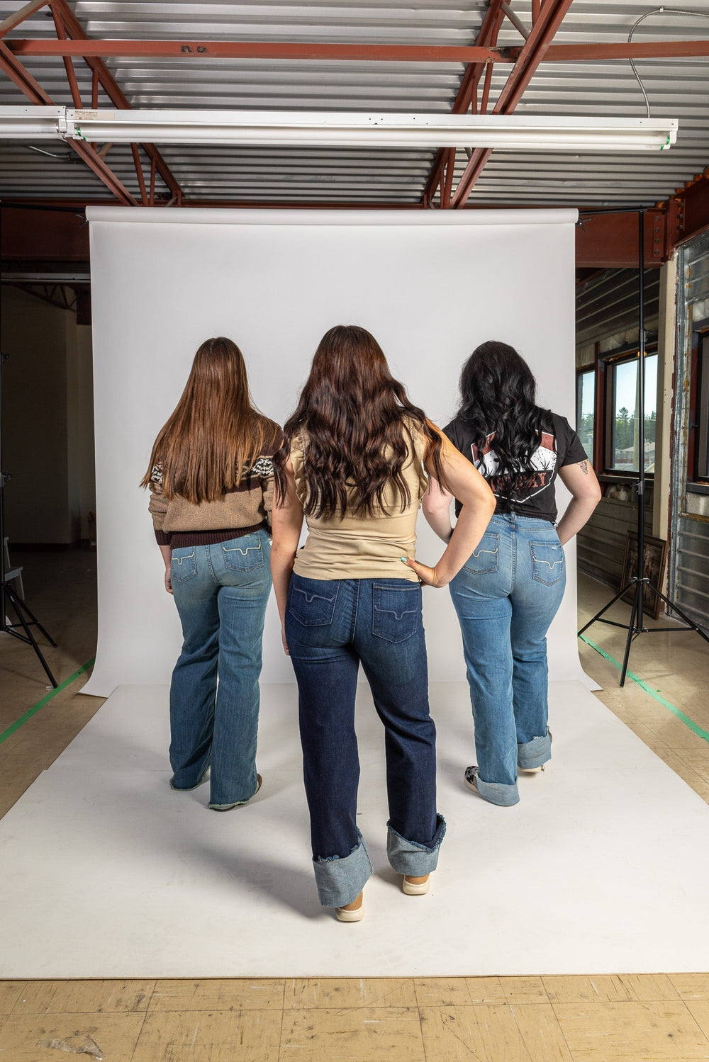 Three Wei's customers wearing Kimes Ranch Olivia jeans in light and dark wash