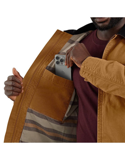 Carhartt 106234 Rugged Flex relaxed fit duck Detroit jacket, full-length back view on a model.