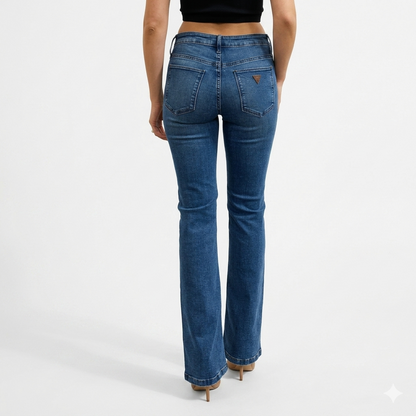 Guess Sexy Boot mid-rise bootcut women’s jean in a dark wash denim, full-length back view.
