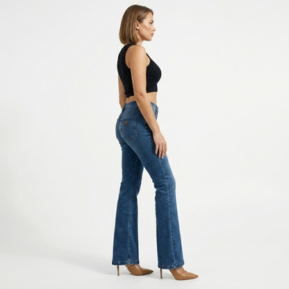 Guess Sexy Boot mid-rise bootcut women’s jean showing a close-up of the back pockets and signature Guess triangle logo patch.