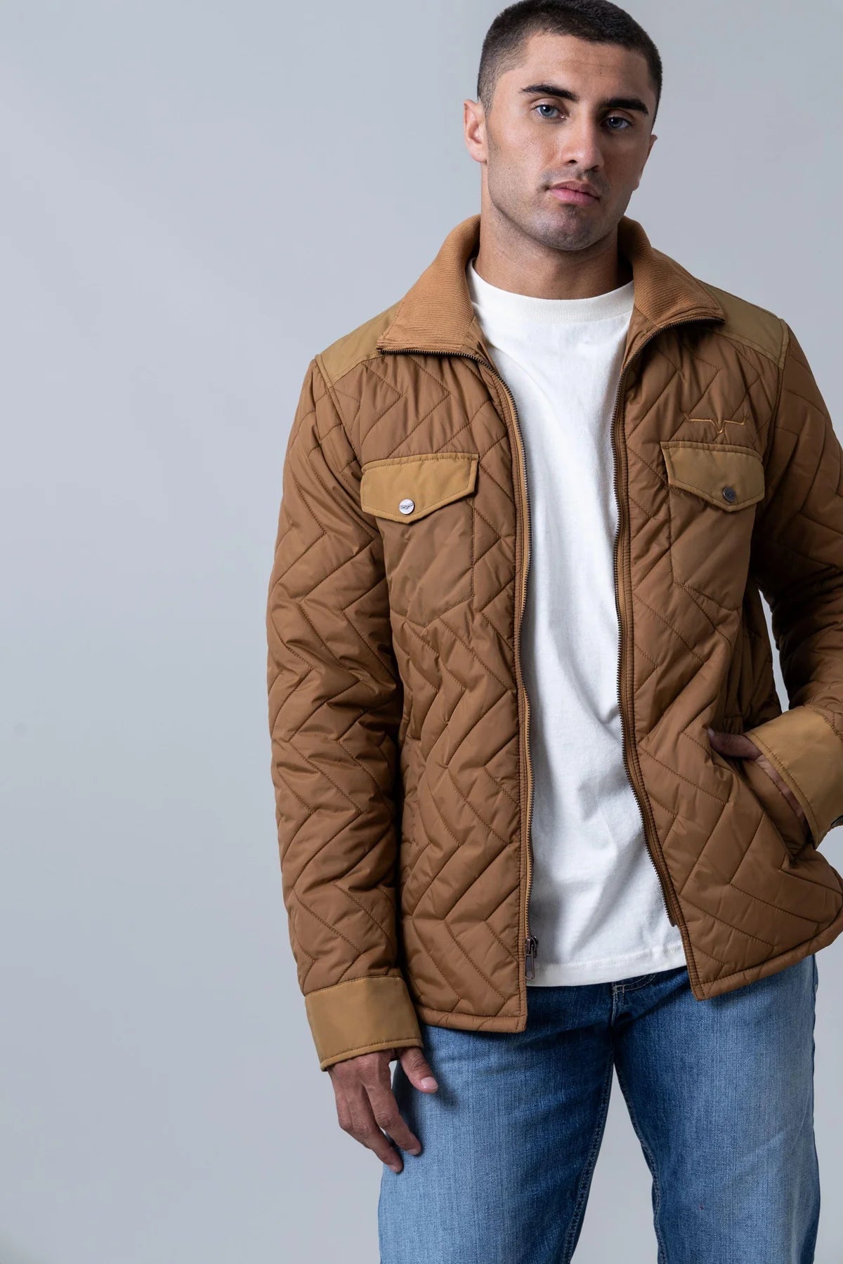 Kimes Ranch Skink quilted nylon jacket in Brown, front view showing earth-tone colorway.
