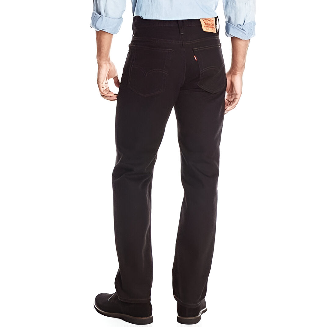Levi’s 516 slim straight leg men’s jean in black denim, back profile view.