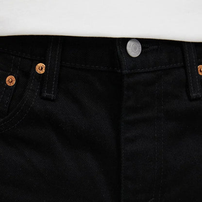 Levi’s 516 slim straight leg men’s jean showing close-up of the front waistband and button.