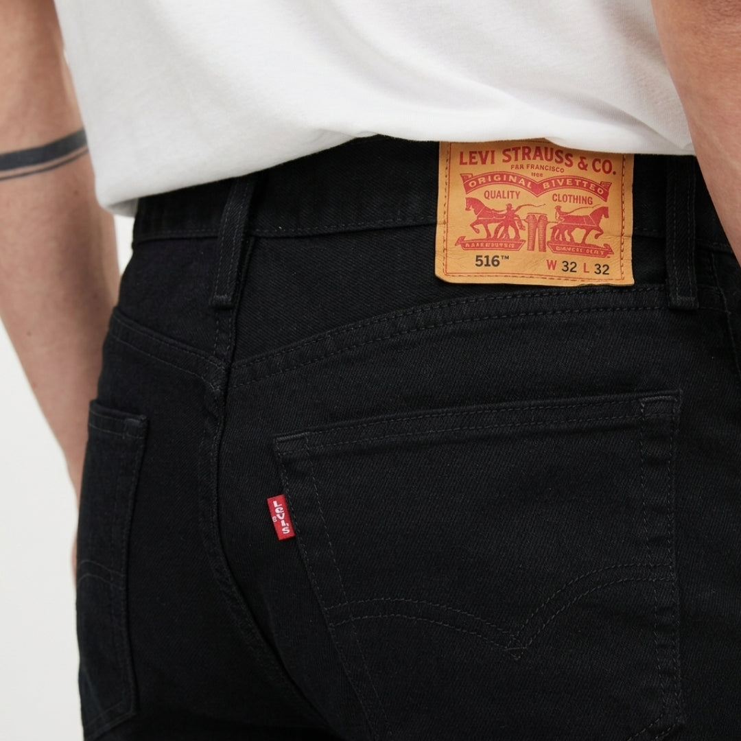 Levi’s 516 slim straight leg men’s jean showing classic back pockets and Levi’s leather patch.