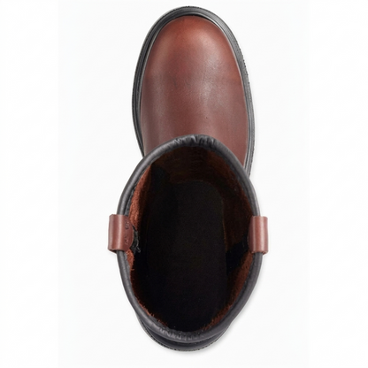 Red Wing 11-inch CSA steel toe pull-on work boot in brown leather, close-up on heavy-duty sole tread.