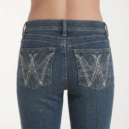 Wrangler Q-Baby mid-rise bootcut jeans in medium wash denim, close-up back pockets view.