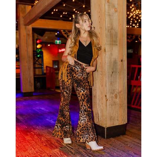 Wrangler X Lainey Wilson leopard print bell bottom jean, full-length front view.