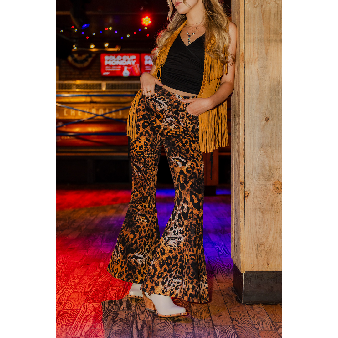 Wrangler X Lainey Wilson leopard print bell bottom jean, side profile view.